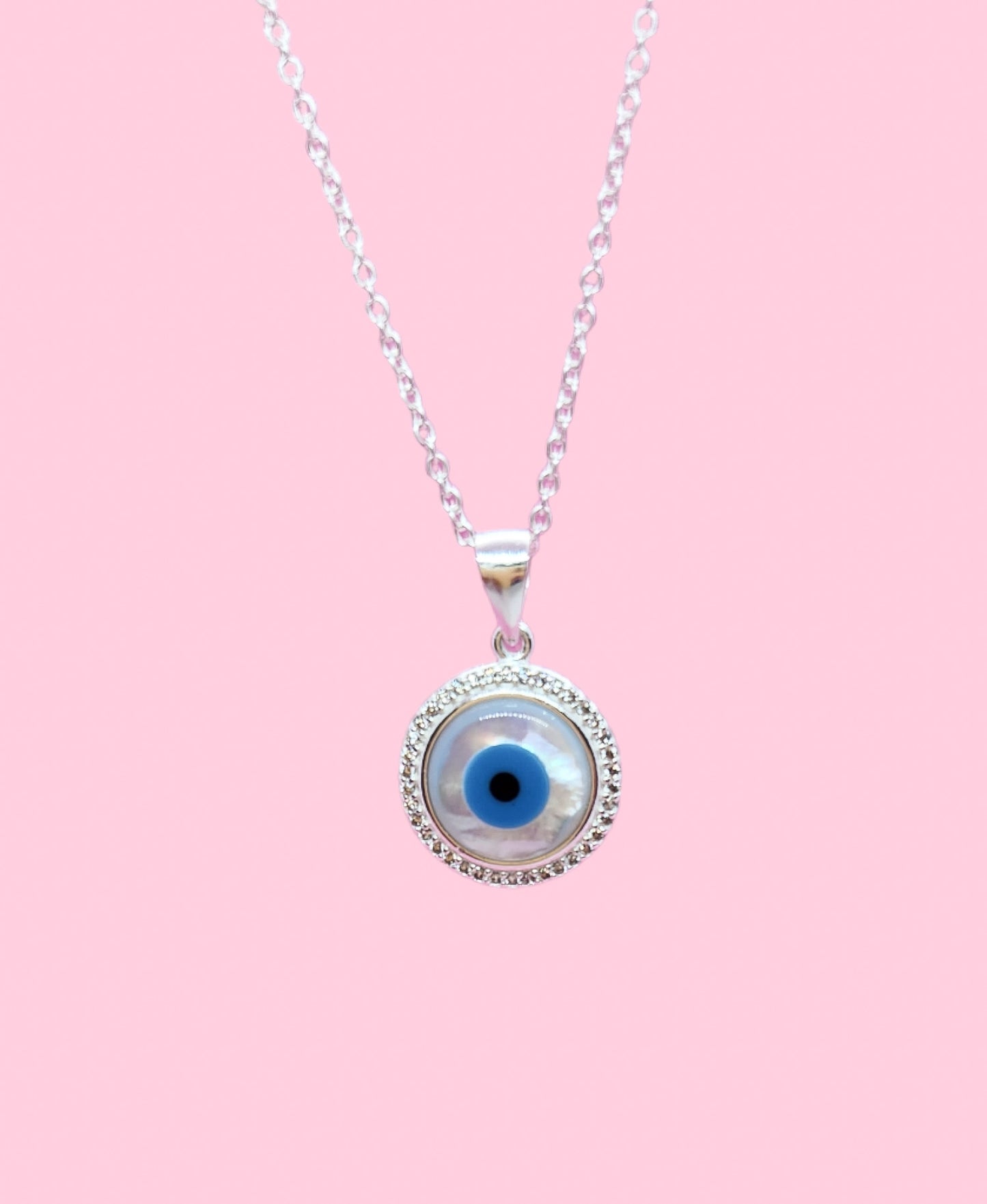 Gargantilla con dije de ojo turco en forma redonda(madre perla)