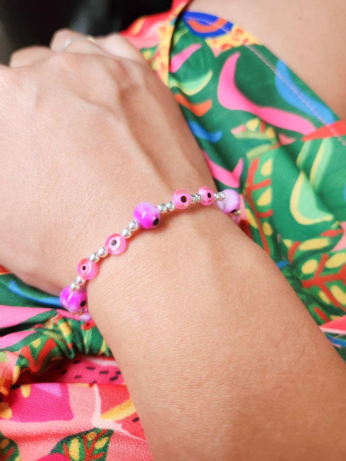 Pulsera de bolitas de plata con ojito turco rosas