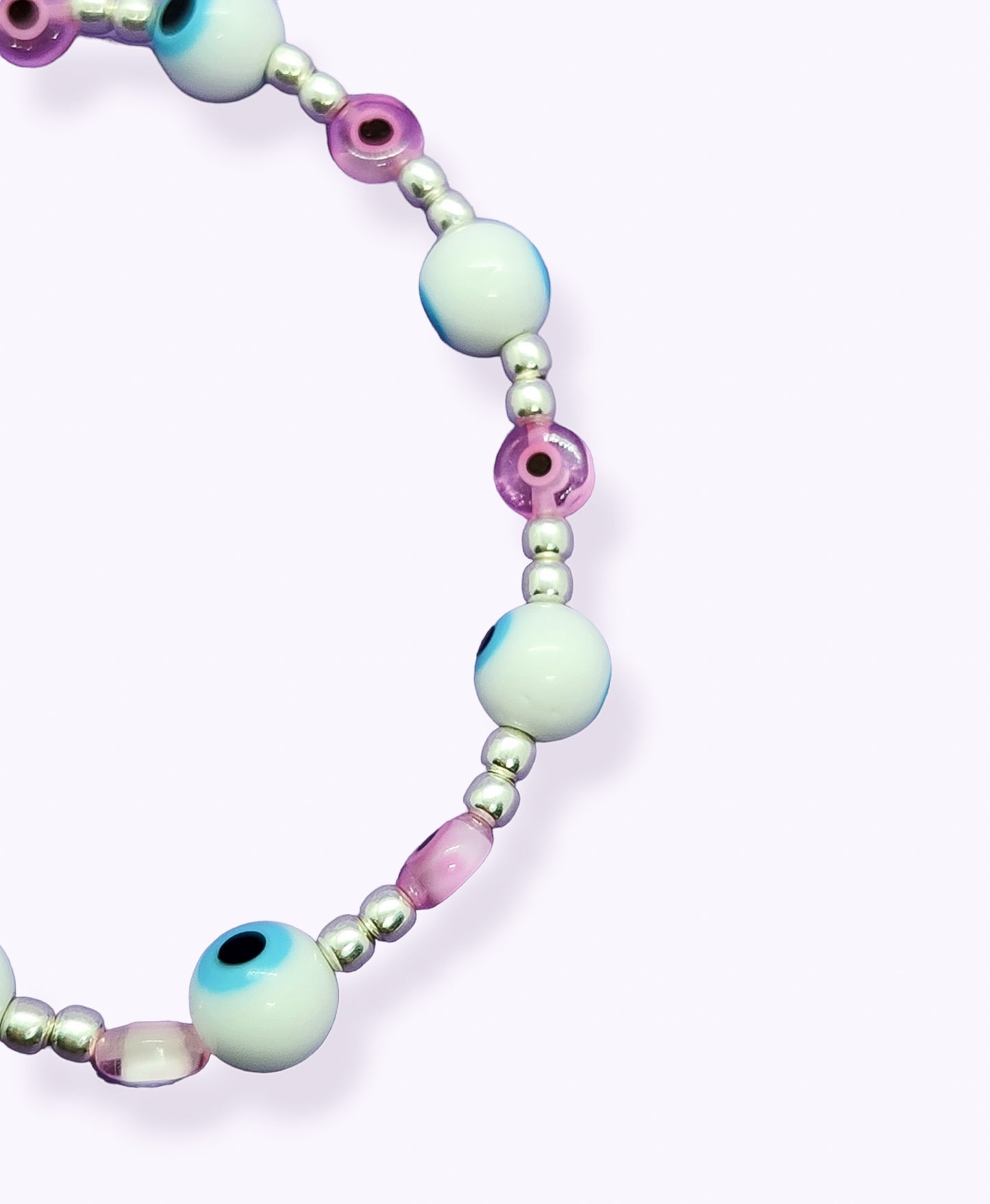 Pulsera de bolitas de plata con ojito turco rosa y blanca