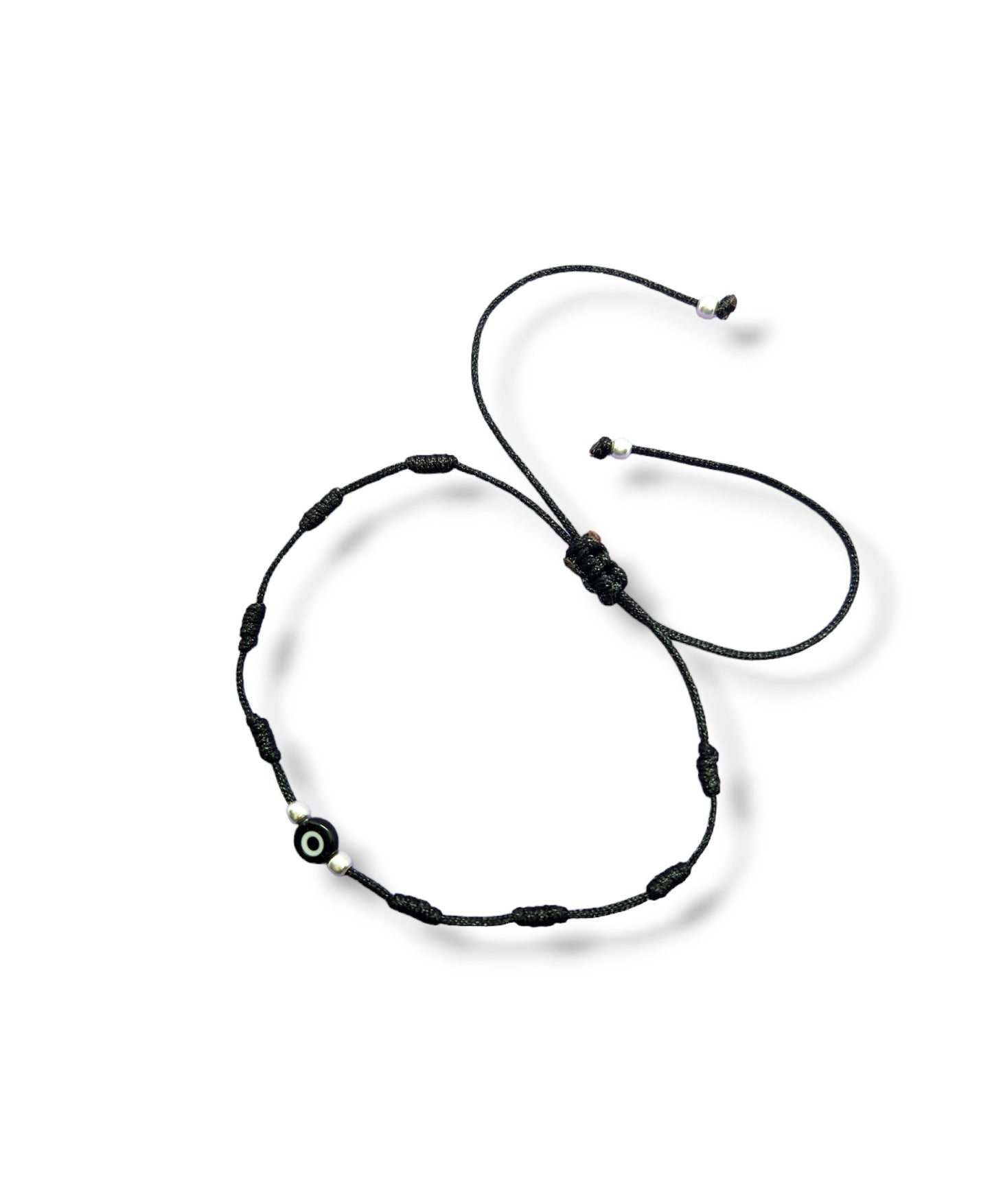 Pulsera de hilo negro con ojo turco y bolitas de plata