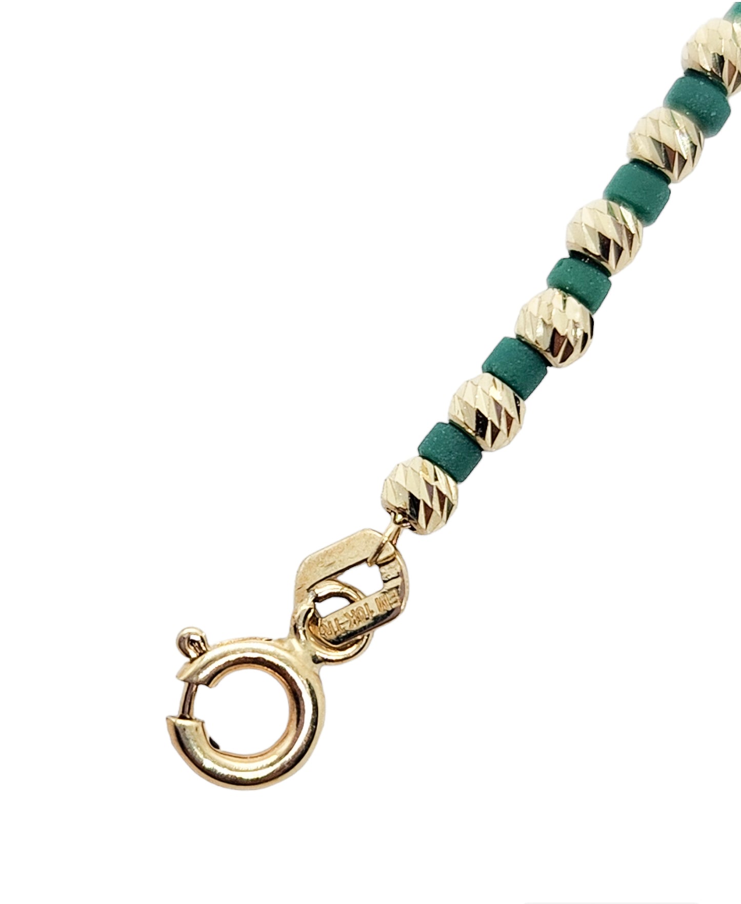 Pulsera con bolitas facetadas de oro 10k color verde