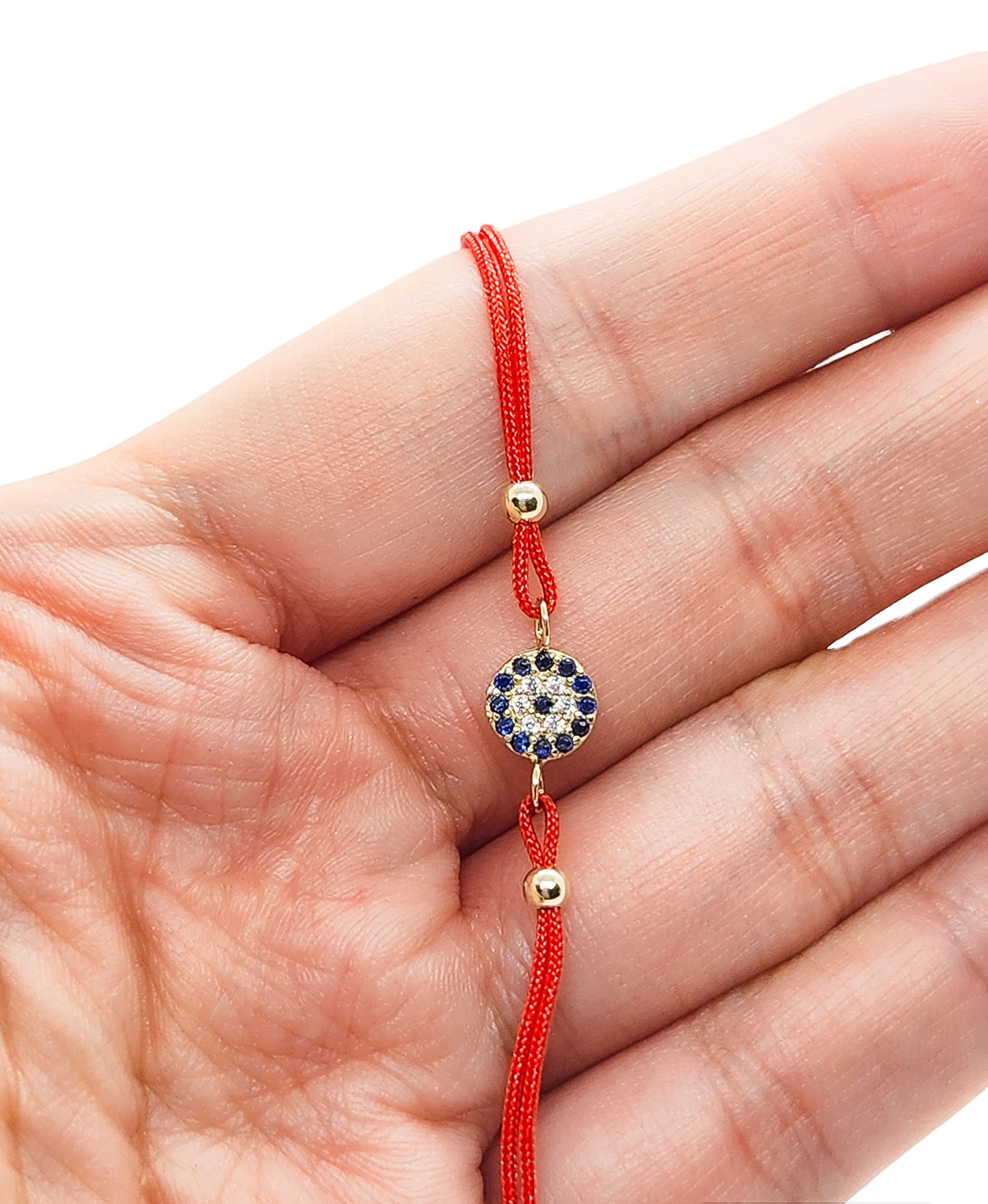 Pulsera ojo turco de hilo rojo ajustable oro 10k