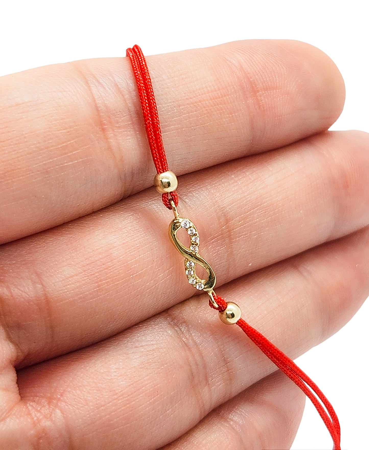 Pulsera infinito de hilo rojo ajustable oro 10k