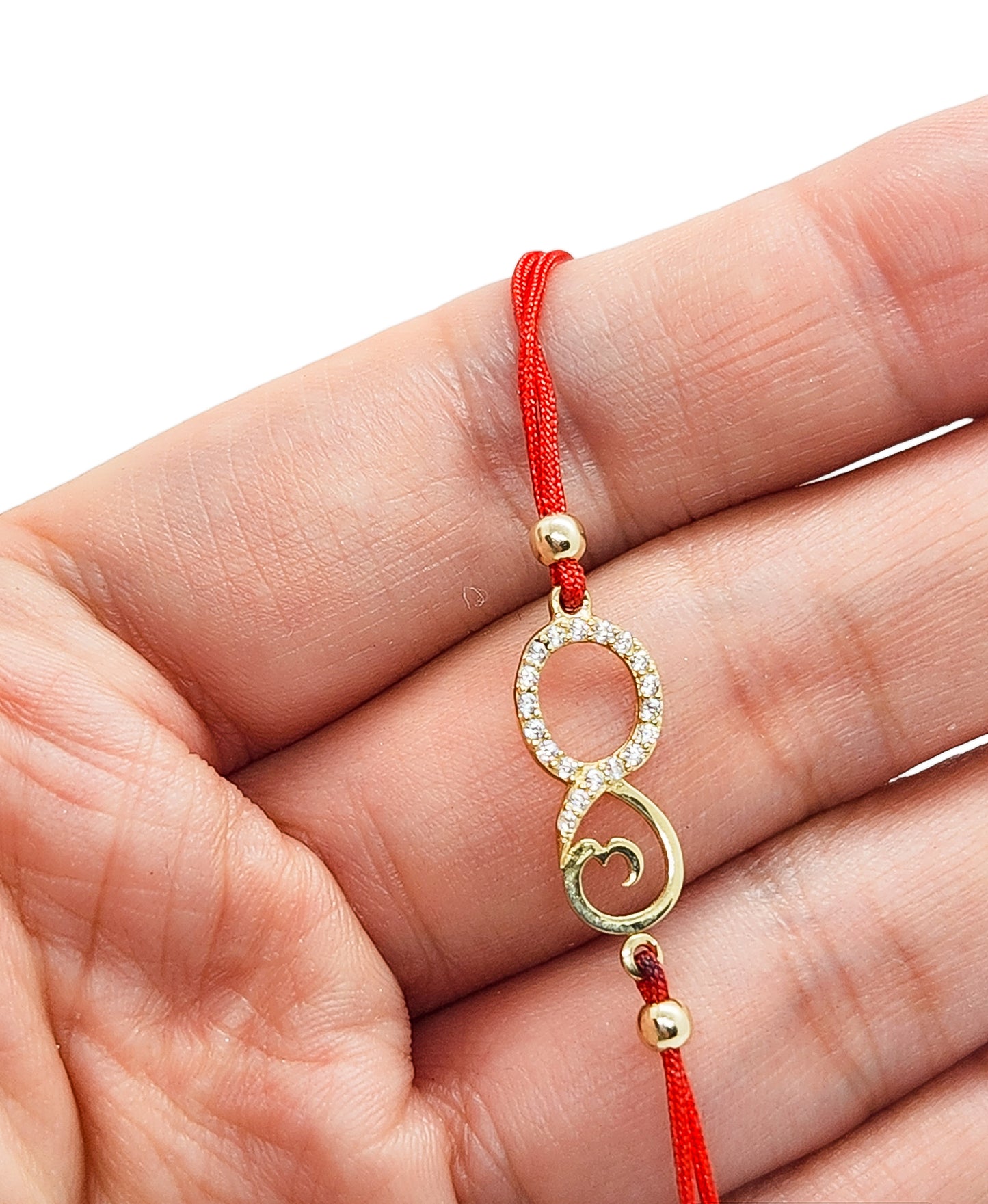 Pulsera infinito grande de hilo rojo ajustable oro 10k