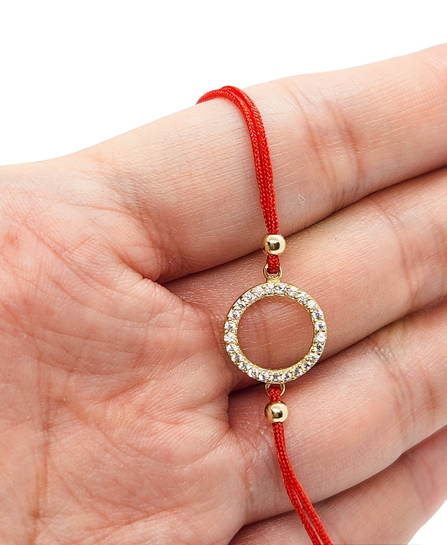 Pulsera círculo de hilo rojo ajustable oro 10k