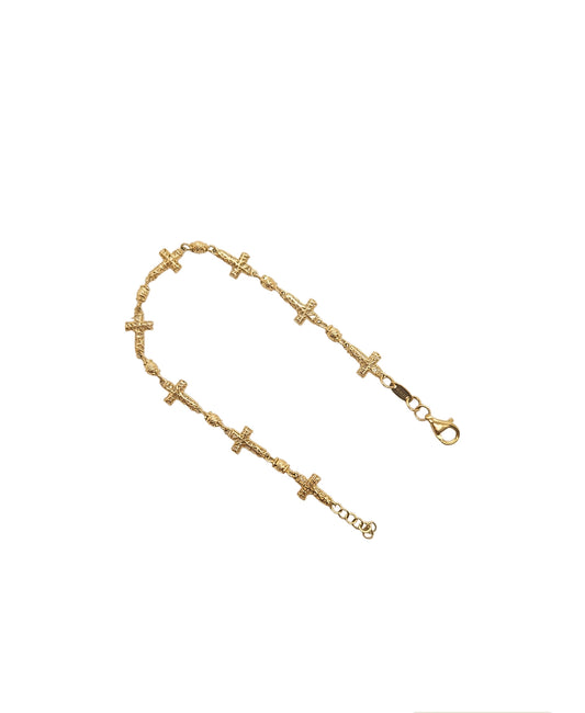 Pulsera de cruz tejida oro 10k