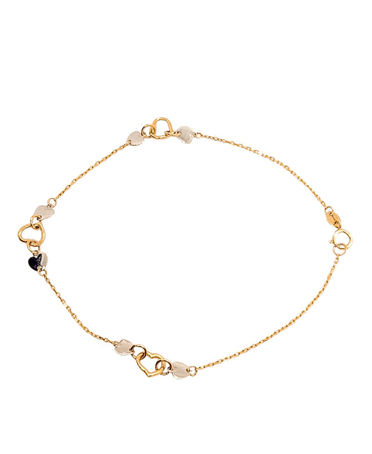 Pulsera con corazones en oro blanco combinada en oro amarillo oro 10k